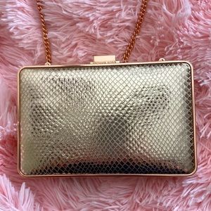 Michael Kors Rosegold snakeskin clutch